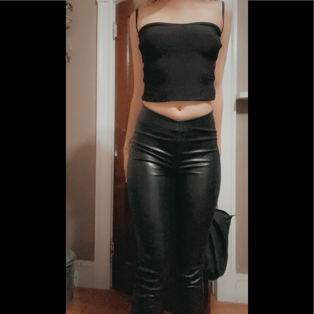 High waisted leather pants/ split bottom. Never worn tags still on. Size 2